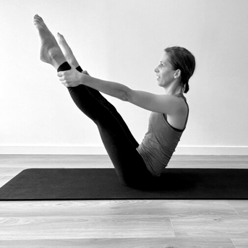 Exercice de Pilates matwork Open Leg Rocker 